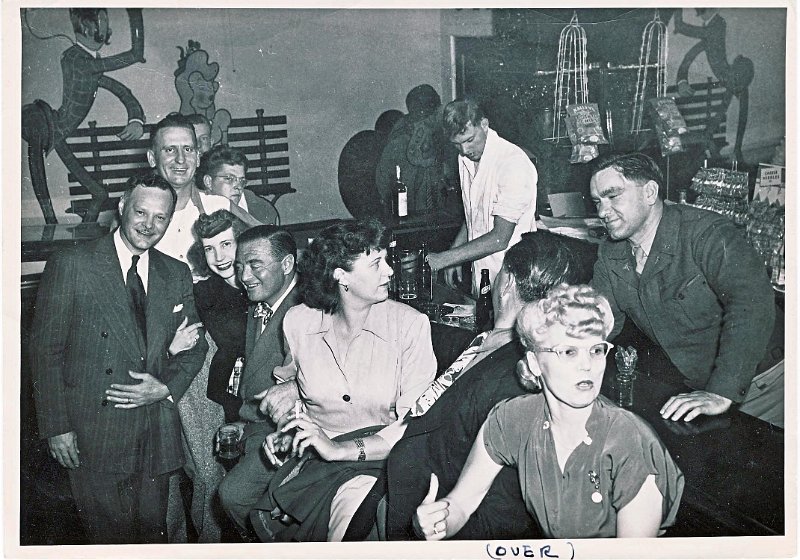 1948 Honey at Madigan Peter with Peter Lorre.jpg - 1948. Helen "Honey" Kaiser (wearing black sweater center left) at Madigan Army Hospital, Ft. Lewis, Washington. To Honey's left sits actor Peter Lorrie.